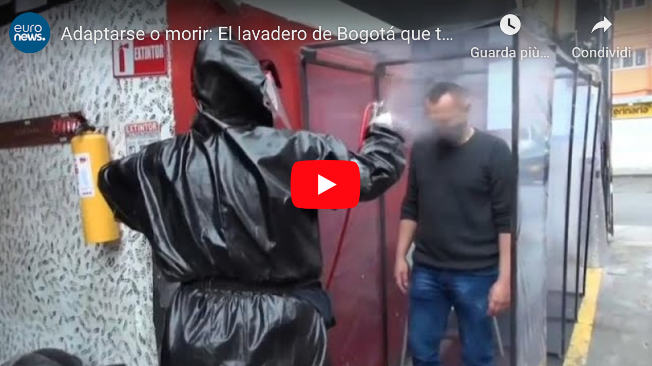 Adaptarse o morir: El lavadero de Bogotá que también desinfecta tu coche